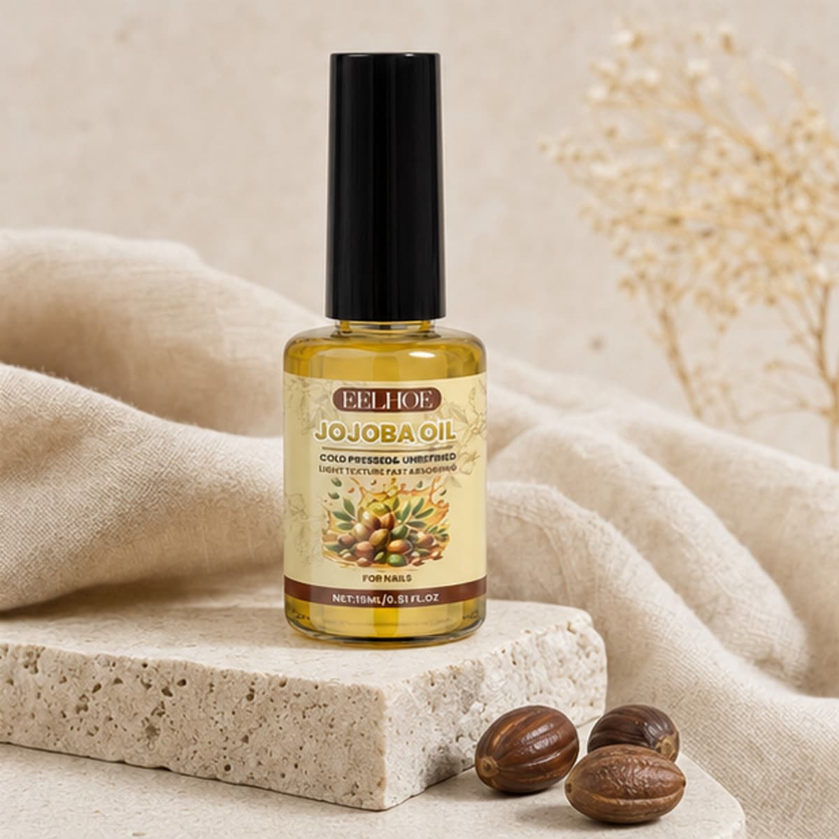 Lunara jojoba nail and cuticle oil styled on warm ivory stone